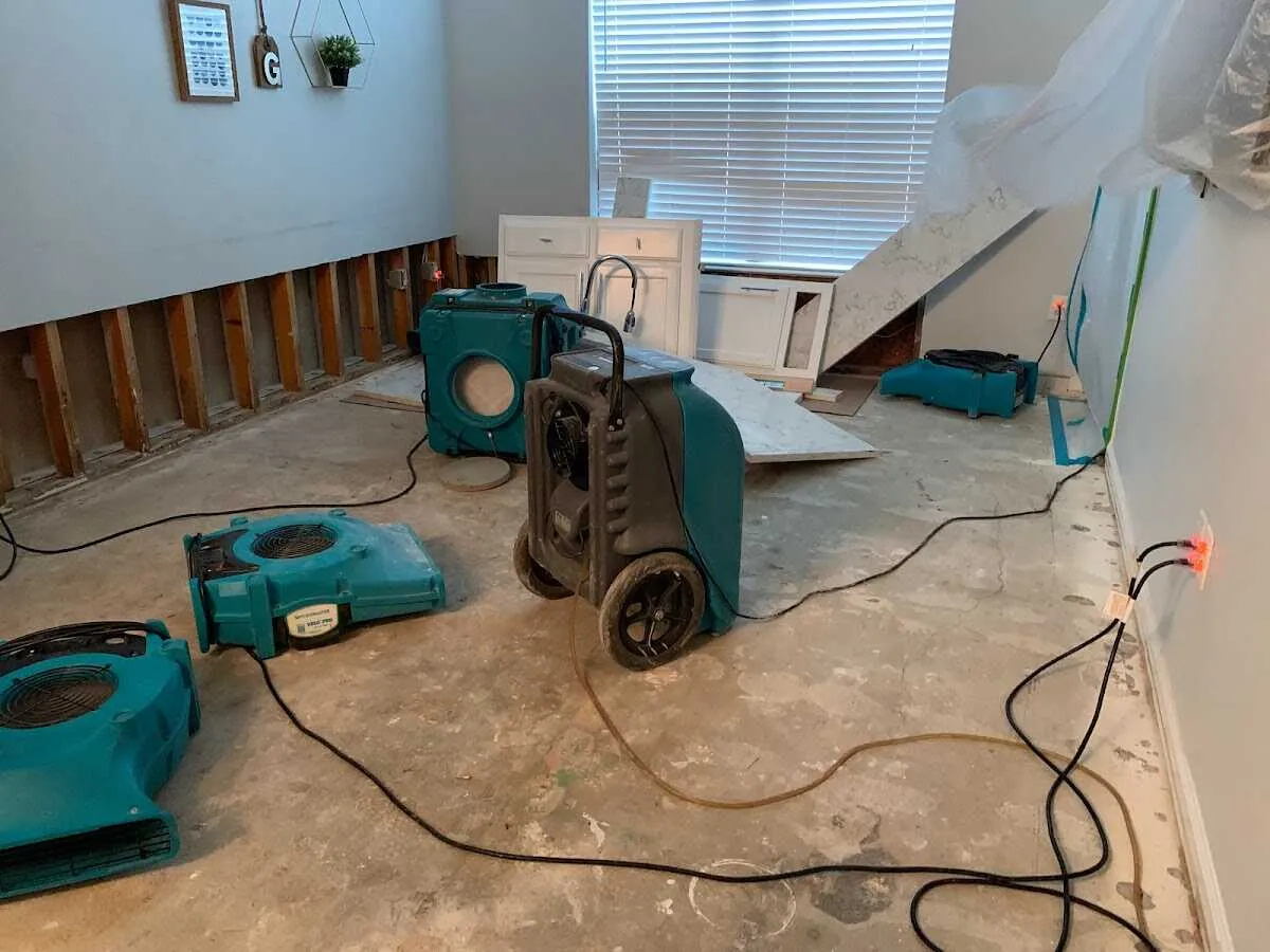 Dehumidifier in flood-cut room for Water Damage Restoration in Burtonsville